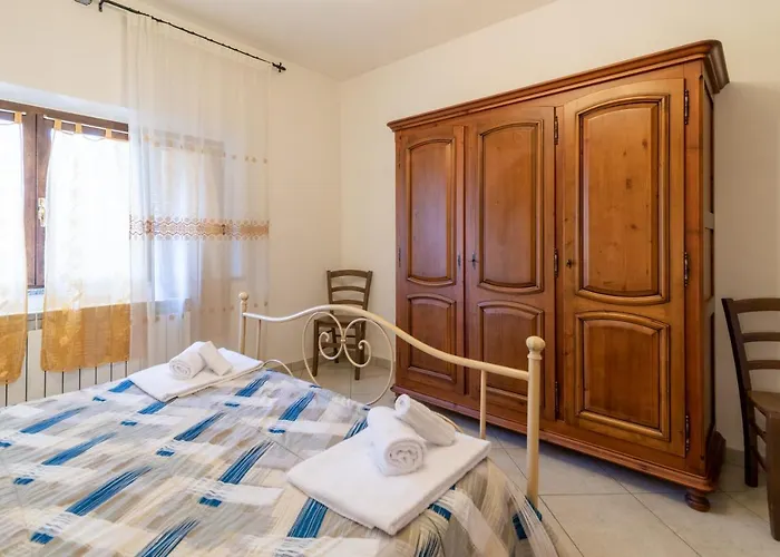 Papa Giuseppe Grande كورتونا